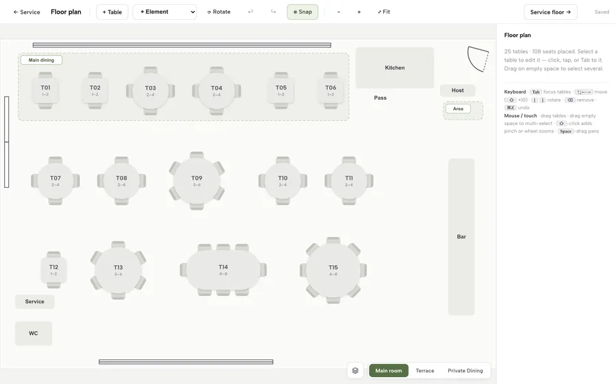 The floor plan editor with the main dining room’s tables laid out around the kitchen, pass, bar and host stand